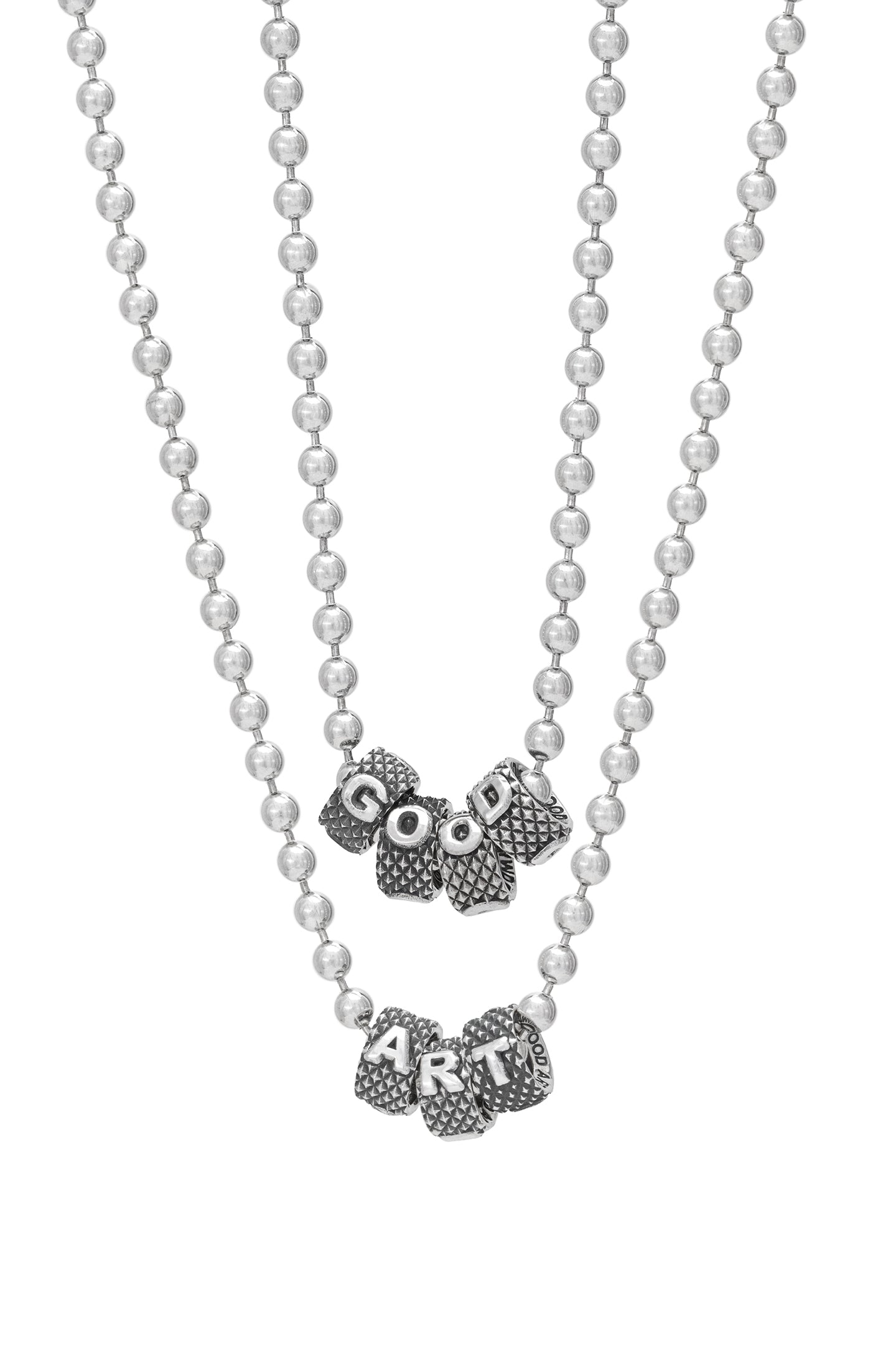 this photo shows the #10 ball chain necklace with ABC rondel spelling out "good" and a second necklace spelling out "art"