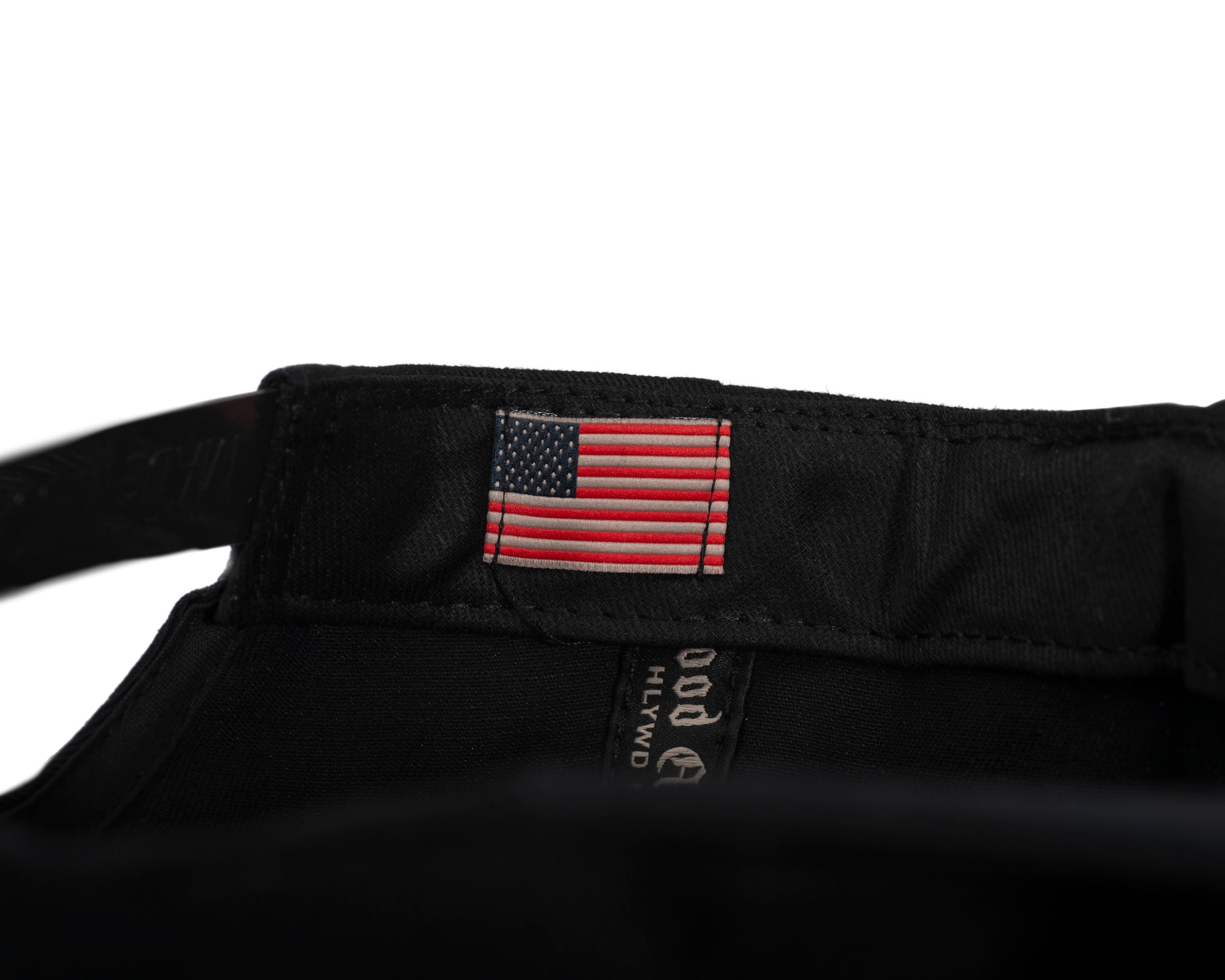 tiny American flag patch stitched in on inside of the hat